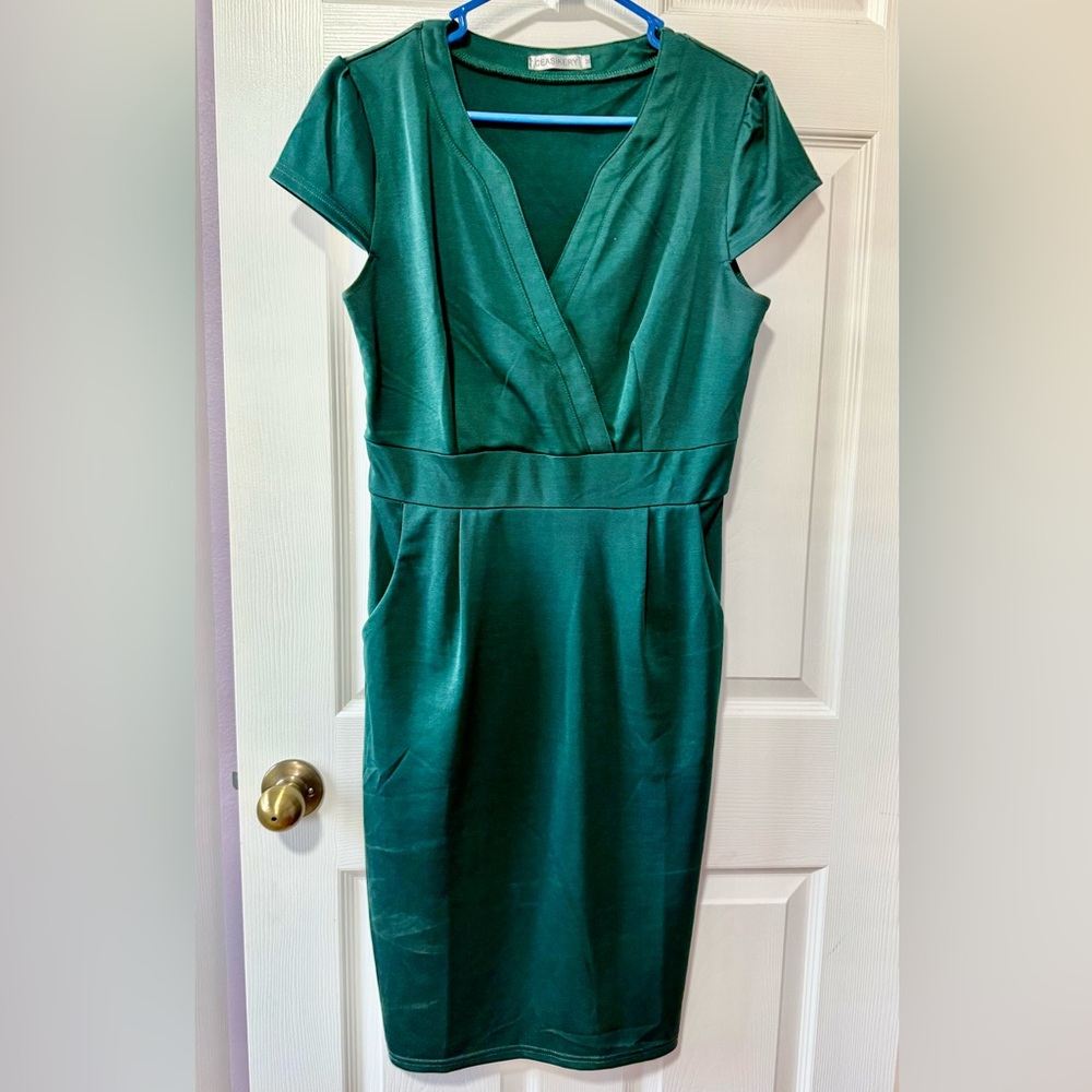 Lovely satiny dress equally perfect for office, cocktail, formal evening.
